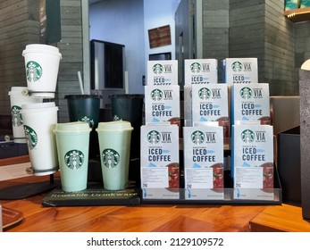 Surabaya, Indonesia - Jan 2022 : Pile of iced coffee and cups at Starbucks