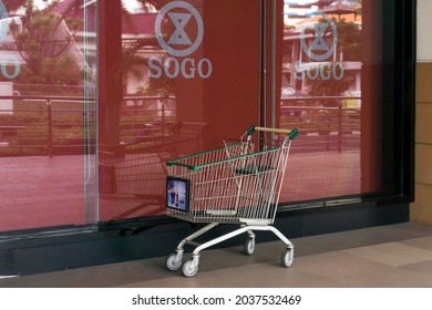 SURABAYA, INDONESIA - September 06, 2021: Empty Supermarket Trolley Placed In Front Of Sogo Department Store Or In Front Of Mall Terrace