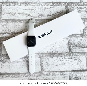 SURABAYA, INDONESIA-JAN 29th,2021- White Apple Watch SE 40mm, Silver , White Strap