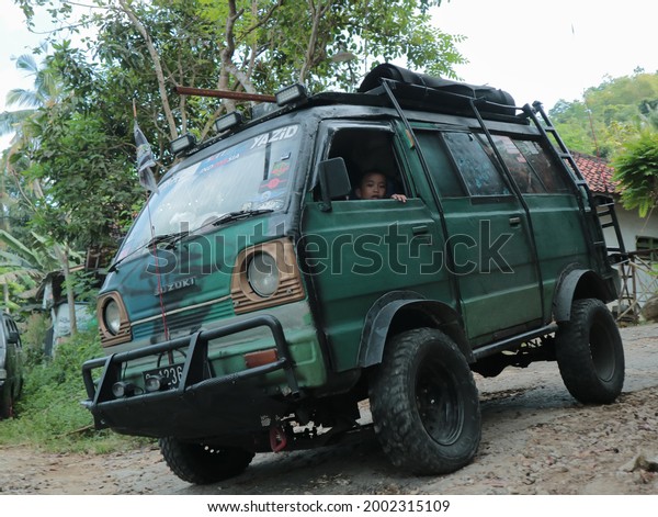 Surabaya may 21th, 2021, Private car, Mini Van of \
Suzuki carry.