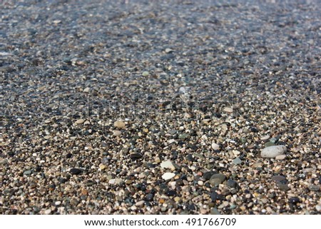 Similar – Lots of colorful stones on the beach