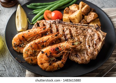 Surf And Turf, New York Strip Steak And Grilled Prawn