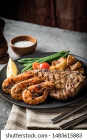 Surf And Turf, New York Strip Steak And Grilled Prawn