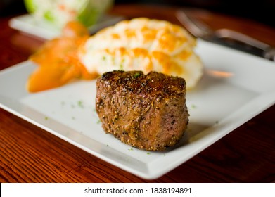 Surf ‘n Turf. Steaks And Lobster Tail. Grass Fed Angus Steak And Maine Lobster Tail Served With Traditional Steakhouse Side Dishes. Classic American Fine Dining Restaurant Entree.