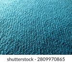 Surface blue microfiber plastic carpet mat texture. blue seamless carpet texture shot from above texture background