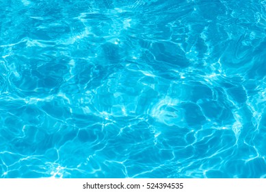 surface of blue swimming pool, background of water in swimming pool.