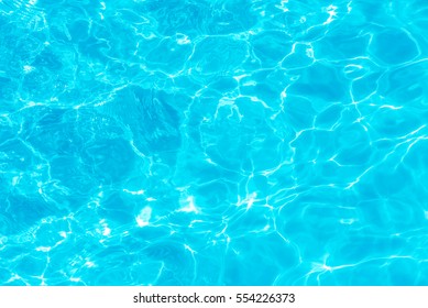 surface of blue swimming pool,background of water in swimming pool. - Shutterstock ID 554226373