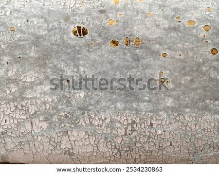 The surface of the brown sofa was worn out, damaged, torn, and damaged. It was a piece of artificial leather. for design, background, ripped sofa seat lining leather, copy space