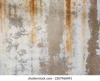 The surface of the cement wall with paint stains from prolonged washing by water. - Shutterstock ID 2207960491