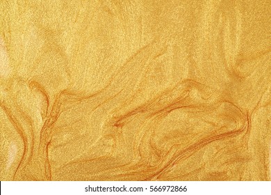 Surface coated with glossy glitter nail polish paint as a backdrop texture composition