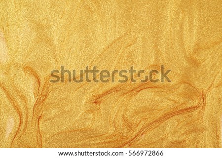 Surface coated with glossy glitter nail polish paint as a backdrop texture composition