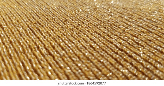 The Surface Of The Fabric, Mustard-colored With Lurex (knitted Elastic Band, Texture).