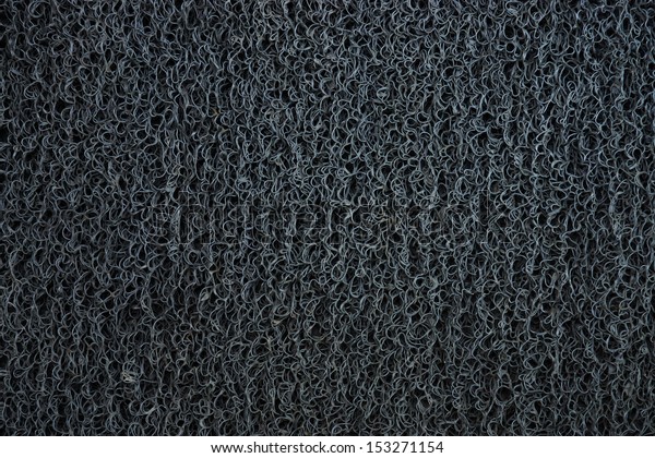 The surface of Grey car\
mat.