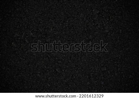Surface grunge rough of asphalt black grainy road, Texture Background, Top view
