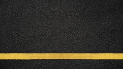 Surface Grunge Rough Of Asphalt, Seamless Tarmac Dark Grey With Yellow Line On The Road And Small Rock, Texture Background, Top View