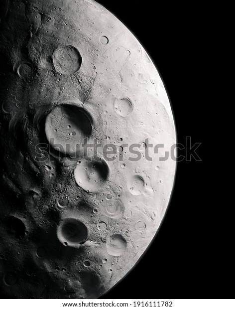 surface of\
the moon with craters, planetary\
satellite.