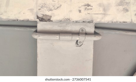 Surface Mounted PVC Electrical Conduit Pipes Running Along Concrete Ceiling and Beam, Industrial Wiring Protection System in Building Infrastructure with Mounting Brackets