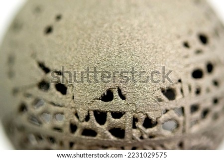 The surface of object printed on 3D printer for metal macro. Close-up view of model printed from metal powder on 3D printer. New modern accurate additive technologies. Modeling 3D printing technology