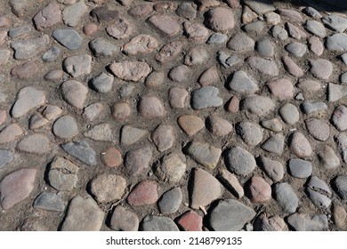 Surface Of An Old Cobblestone Road