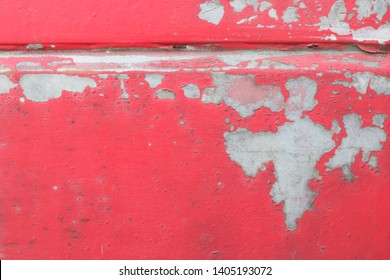 The Surface Of The Red Pickup Truck Car That Have Its Color Is Peeling And Have Rust. Old Walls, Rust-proofing Of Red Cars. Can Be Used As Background Texture.