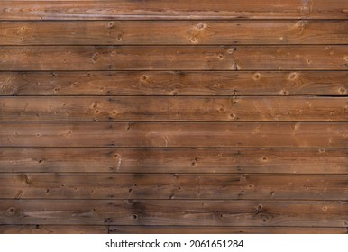 The surface is sheathed with wooden boards. - Shutterstock ID 2061651284