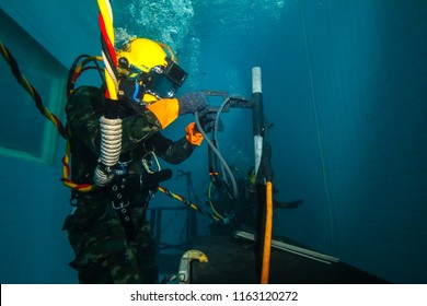 surface supplied commercial diver.
diver.
Underwater.