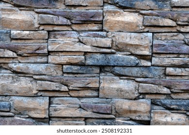 The surface texture of the foundation cladding made of wild stone.