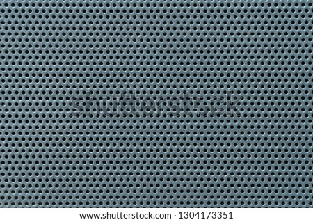 Surface texture of perforated metal sheet, macro.