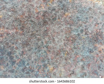 Surface Of The Thick Steel Plate That Is Rusty Brown- Red Color.  It Begins To Weather In Little By Little