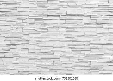 Surface white wall of stone wall gray tones for use as background. 