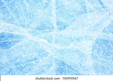 Surface of winter ice on Baikal lake in Siberia . Blue background of Ice texture 