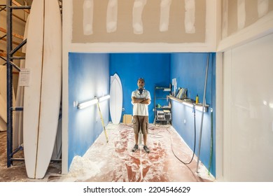 Surfboard Craftsman Shaping Boards In His Shaping Workshop