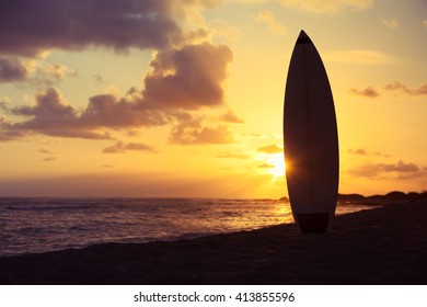 Surfboard On Beach During Sunset Stock Photo Shutterstock