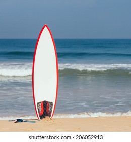 Surfboard In The Sand