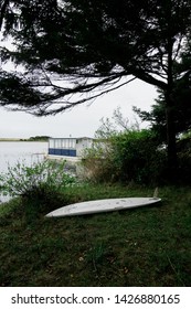 Surfboard And Small Houseboat At Floras Lake In Oregon On The Pacific Coast In The Usa