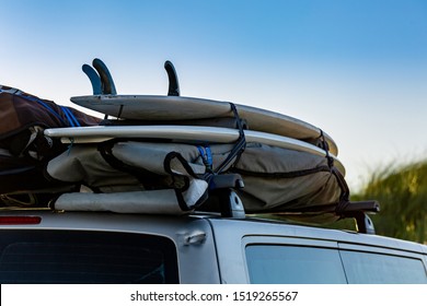 Surfboards Fixed On A Top Of A Car. Surftrip. 