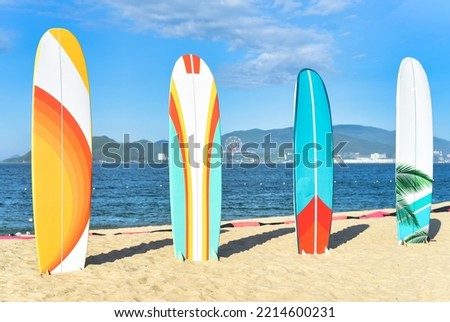 Surfboards on sandy beach in Vietnam