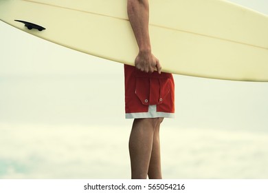 Surfer Dude Holding A Surfboard