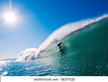 Surfer getting Barreled in California - Powered by Shutterstock