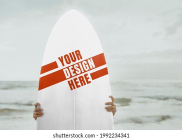 Surfer Holding A Surfboard Mockup