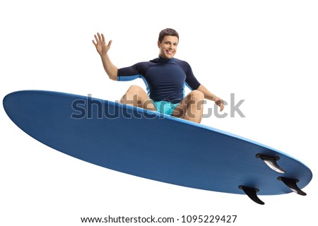 Surfer jumping with a surfboard isolated on white background