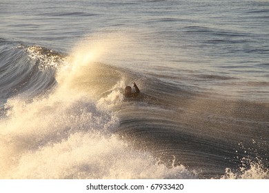 Surfer missing a wave