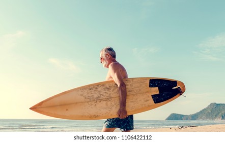 Surfer At A Nice Beach