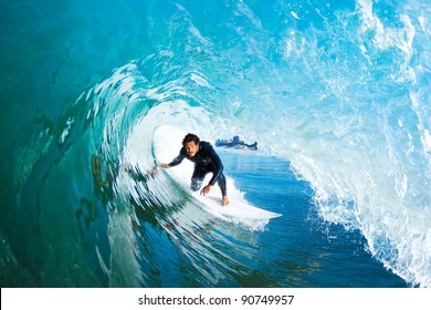 Surfer On Blue Ocean Wave