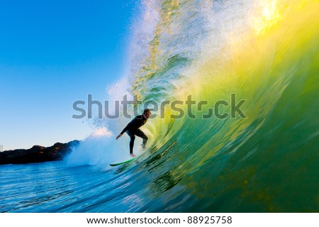 Surfer on Wave at Sunset