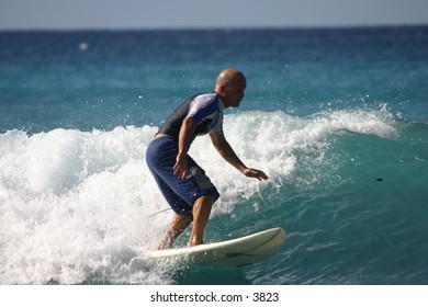 surfer riding the waves