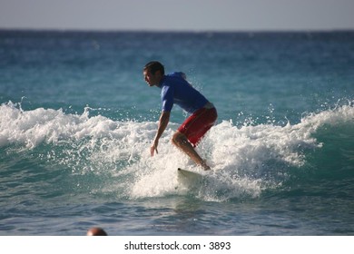 surfer riding the waves