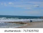 Surfer in Sausset les Pins beach