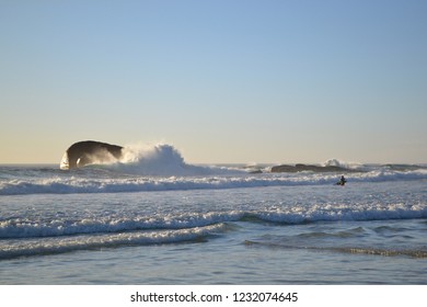 Surfer at sunset