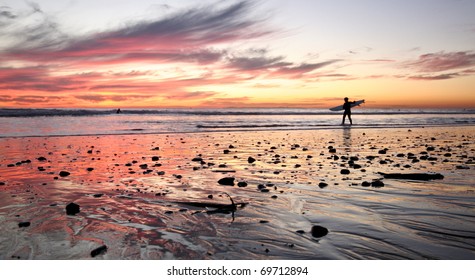 Surfer at sunset